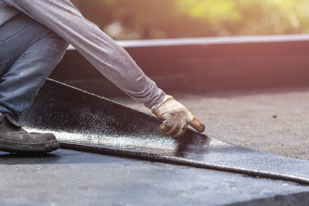 Professional Waterproofing technician working in Folsom, PA